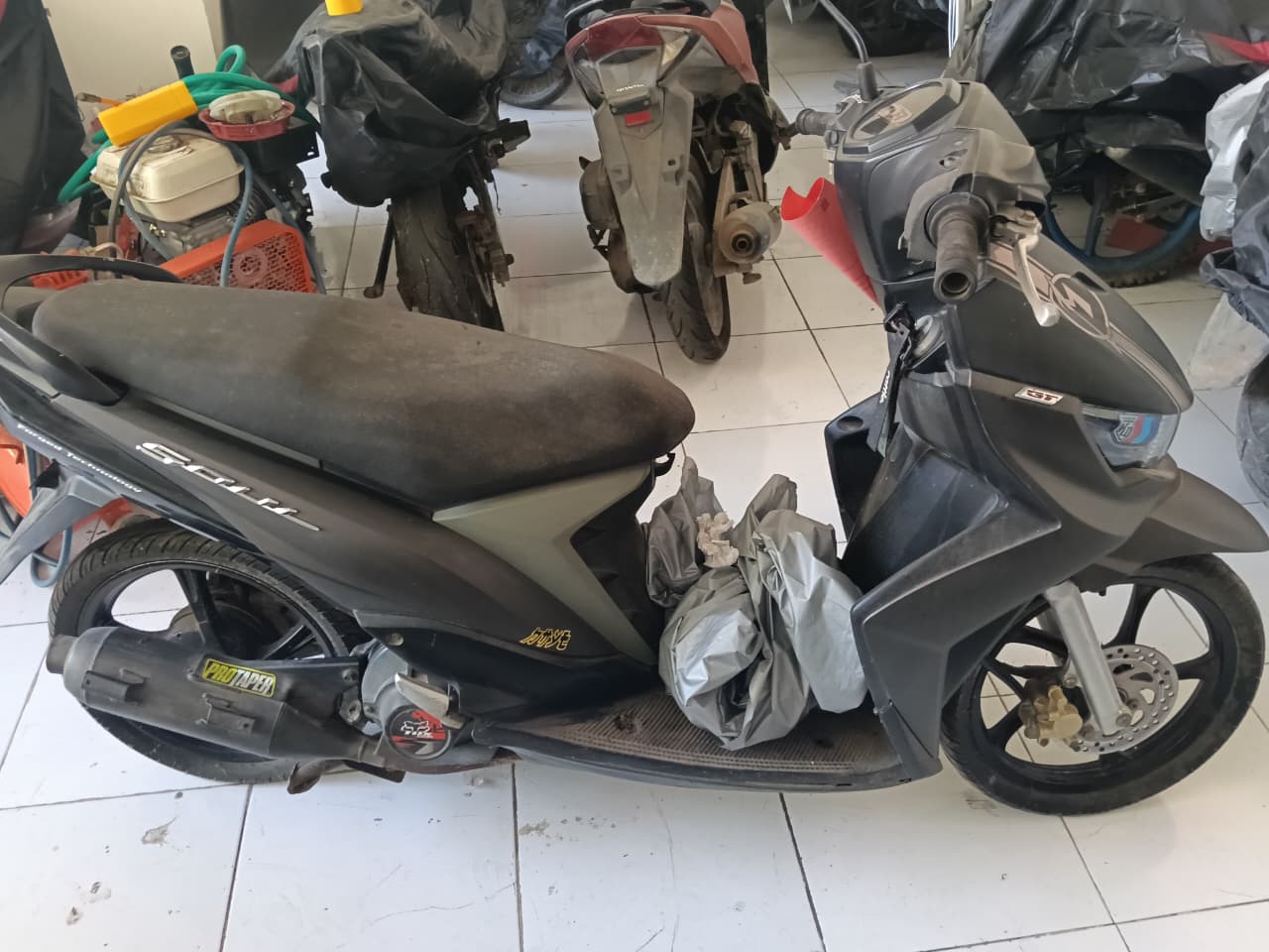  1 (Satu) unit kendaraan sepeda motor mio soul warna hitam