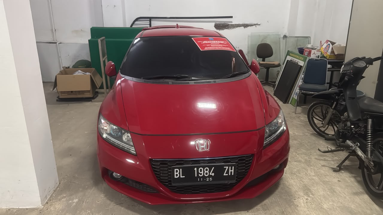 1 (satu) unit mobil merk Honda Type Cr-Z F1 1,5 Cv tahun 2015, warna merah milano, No. Polisi  BL 1984 ZH, No. Rangka JHMZF1421FS300555 No. Mesin LEA35000170