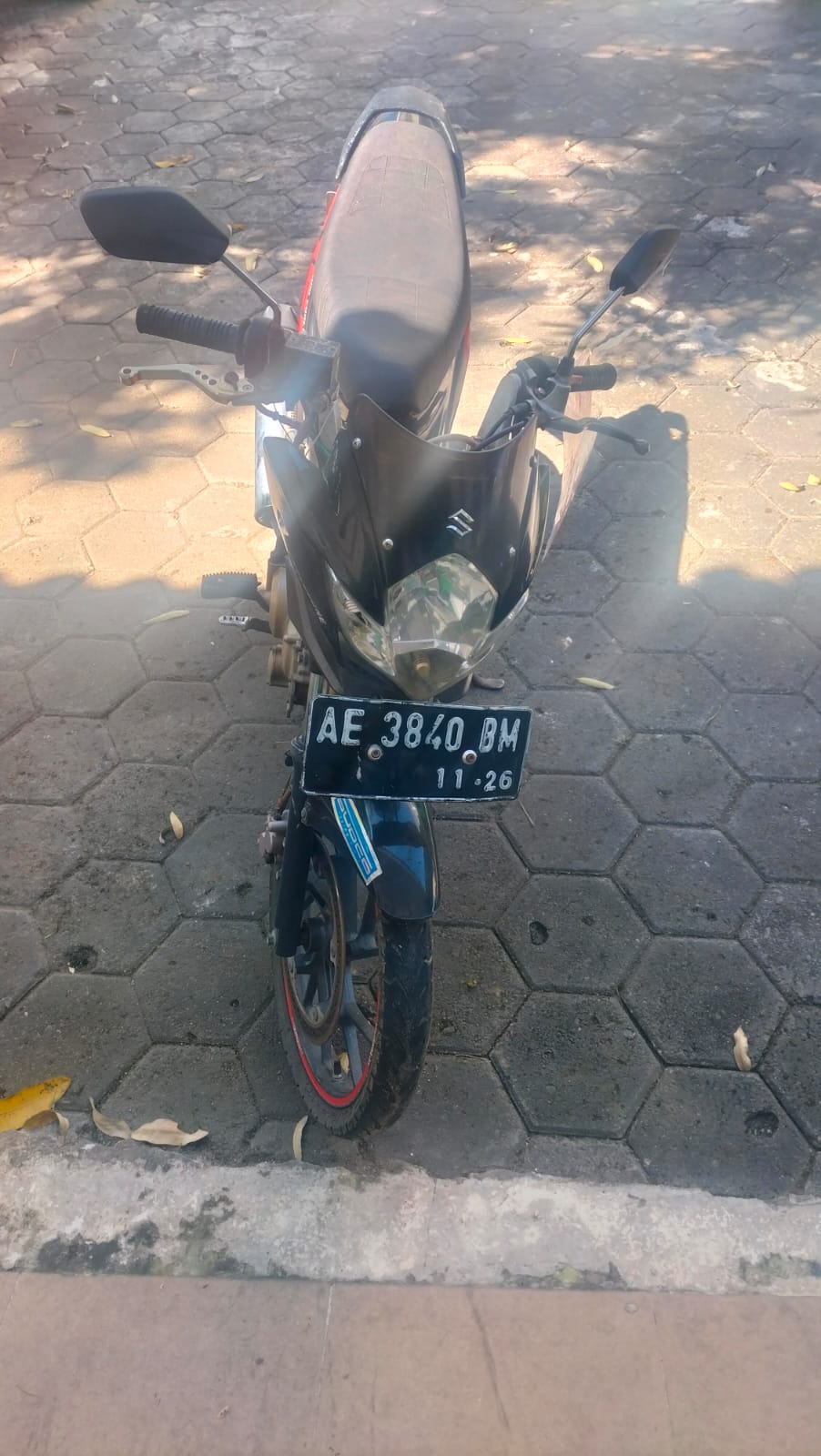 1 (satu) unit sepeda motor merk Suzuki berwarna hitam dengan Nopol AE 3840 BM