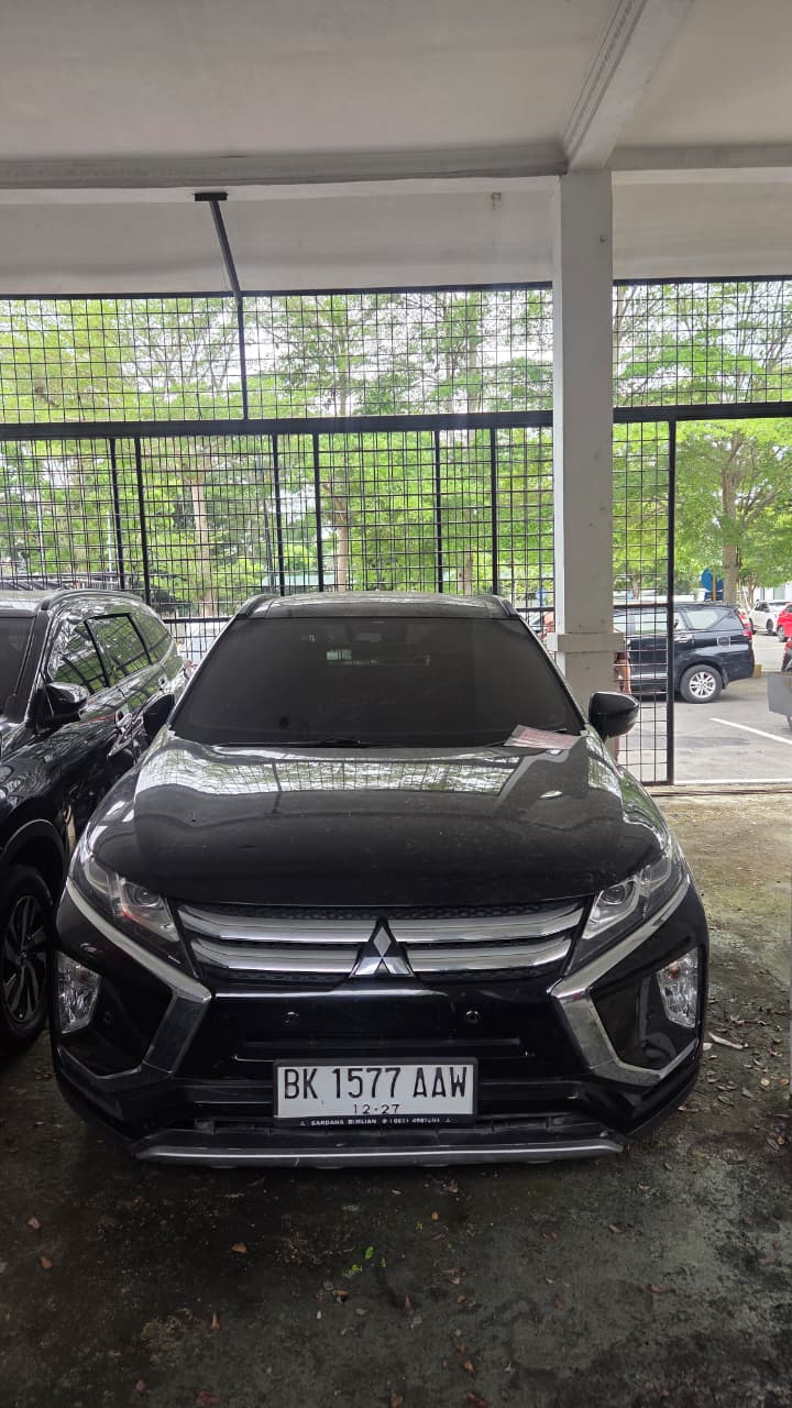 1 (satu) unit Mobil merek Mitsubishi  Eclipse Cross Ultimate warna  hitam BK 1577 AAW