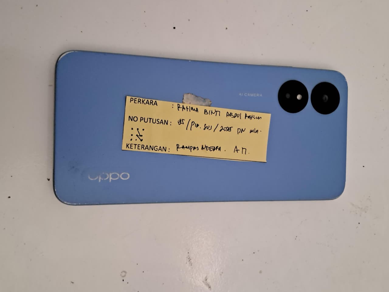 1 (satu) unit handphone merek OPPO A17 warna biru dengan nomor imei 1: 864091048347706, Imei 2: 864091048347706, dengan nomor telepon: 0821 9739-9896;