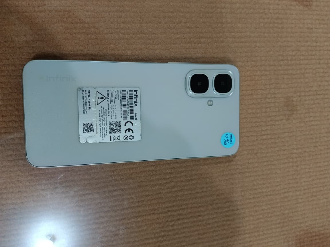 Hand Phone merk Infinix warna cassing  abu-abu dengan nomor sim card 081215160716