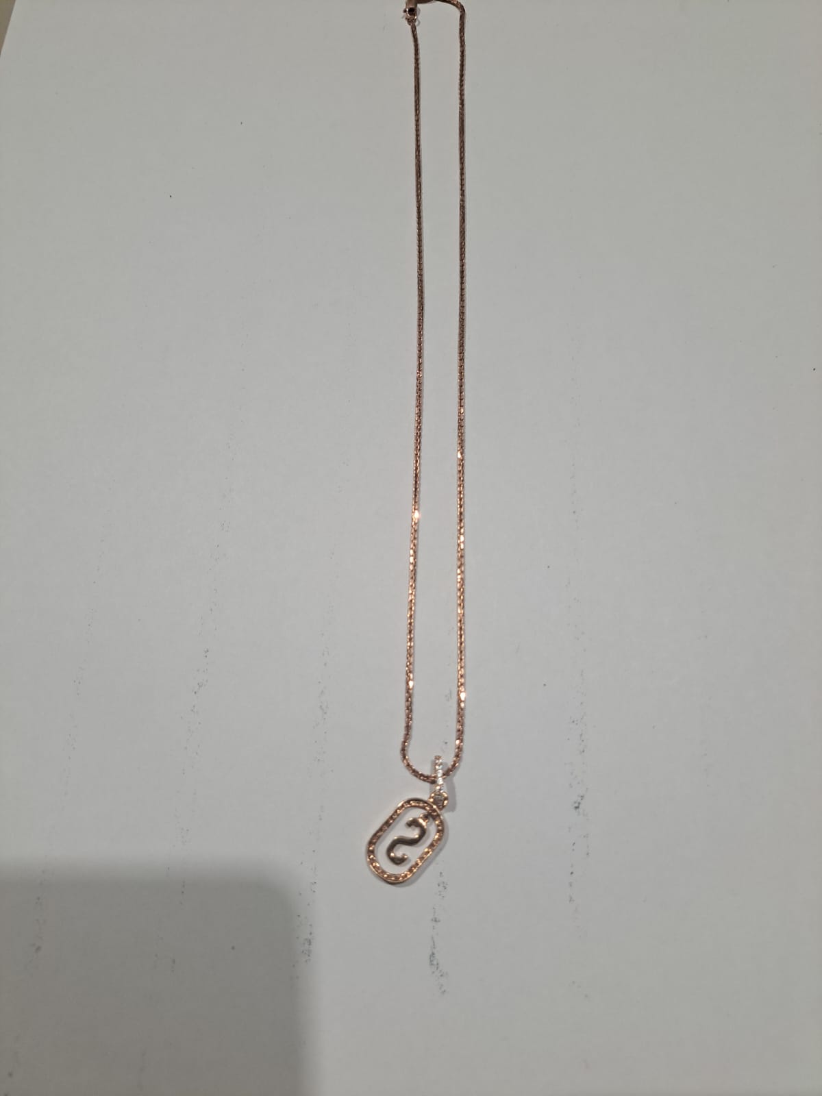 1 (satu) buah kalung 10 karat berat 4.05/3.7 gram tanpa surat