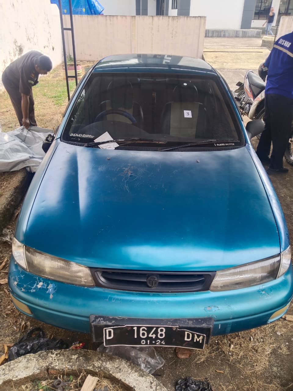 1 (satu) unit Mobil Merk  TIMOR S 515, Nopol : D 1648-DM, Warna Biru  Metalik, Tahun 1996, 1498  CC, No Rangka  KNAFA3212V5633746,  Nosin B5746991, 