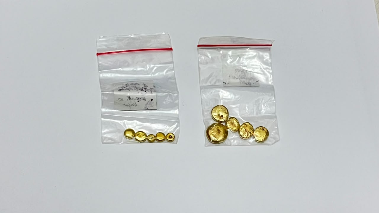 •	51.06 Gram logam dalam bentuk butiran/biji emas sebanyak 11 butir emas
1 (satu) butiran emas seberat LP 10 (1,45) satu koma empat puluh lima gram digunakan untuk pengujian sampel laboratorium, Sisa pengujian sejumlah 10 (sepuluh) butir emas dengan bera