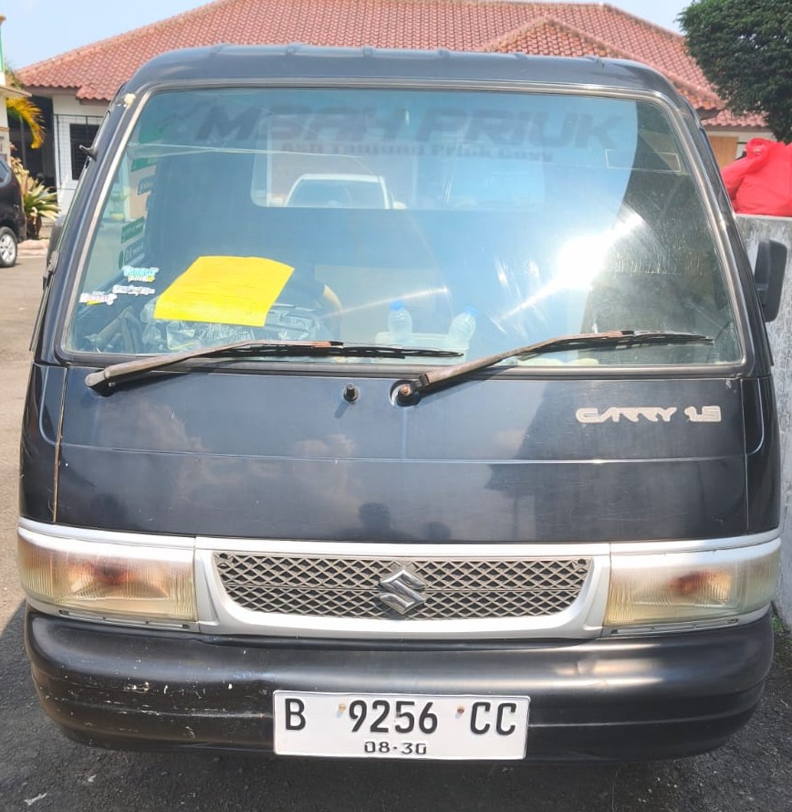 kendaraan R4, Suzuki ST 150 jenis pick up berwarna hitam dengan Nopol B 9256 CC beserta kunci kontak, STNK asli kendaraan R4, Suzuki S 150 jenis pick up berwarna hitam dengan Nopol B 9138 FAO, Plat Nomor kendaraan Nopol B9138 FAO