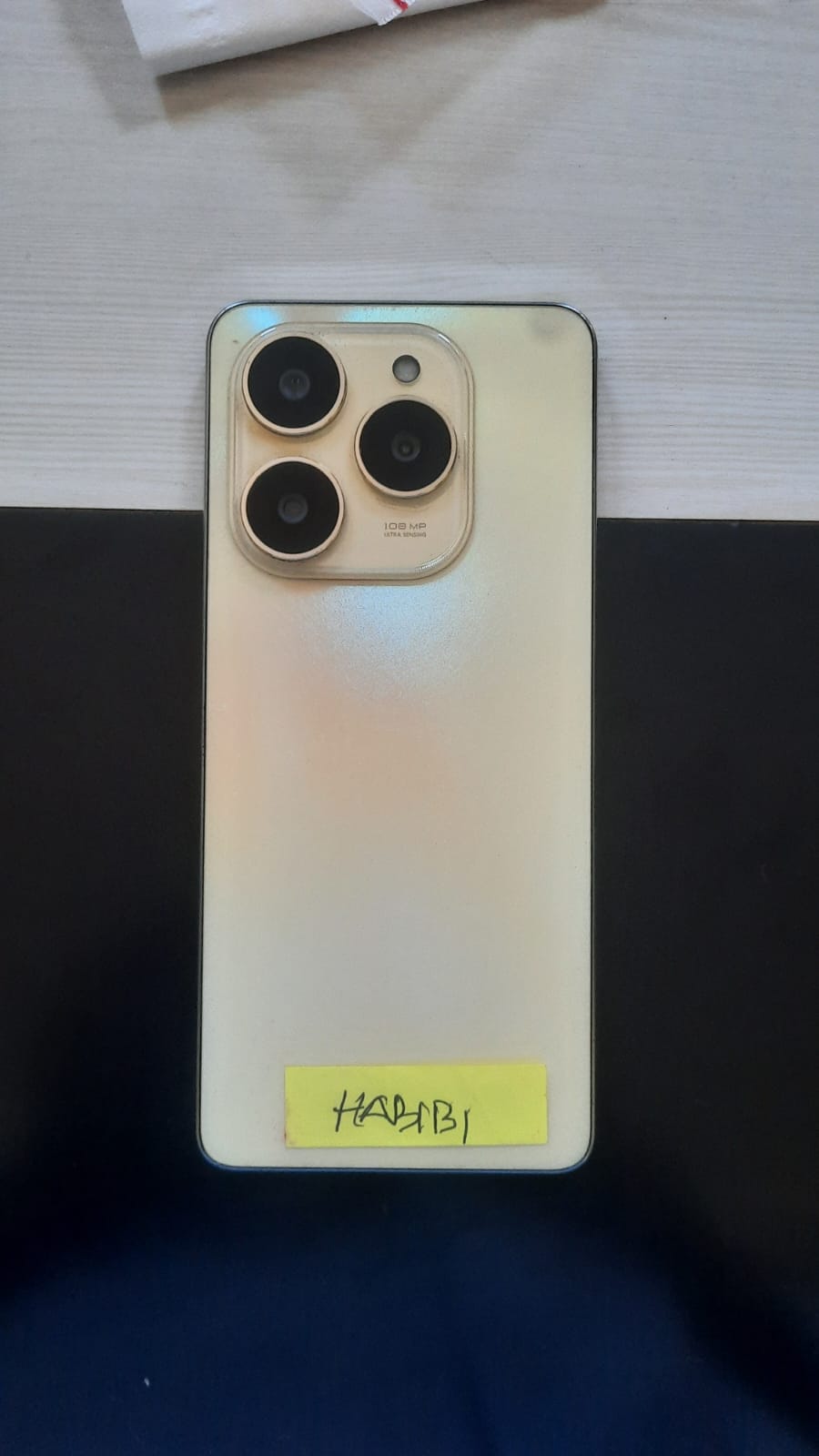 Handphone merk TECNO SPARK 20 Pro berwarna Kuning Lembayung dengan Imei 1 : 352153510912083 dan Imei 2 : 352153510912091