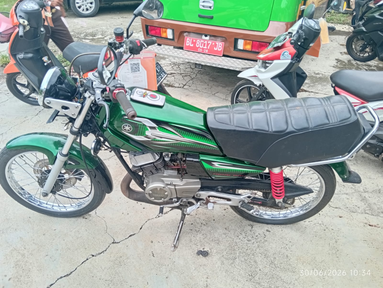 1 (satu) unit sepeda motor merk Yamaha RX King,Warna Hijau,Nomor Polisi BL 3413 LA beserta STNK dan BPKB