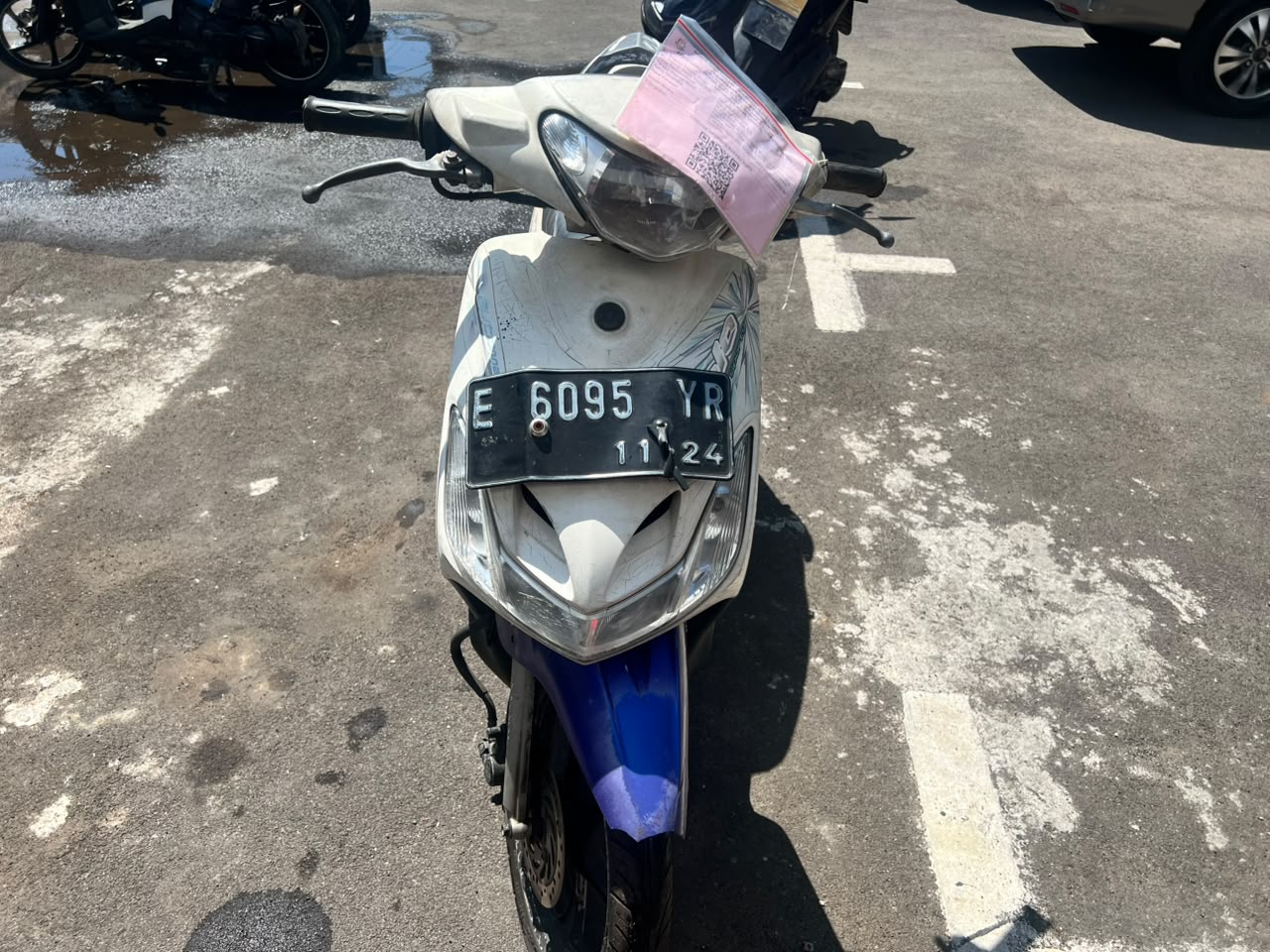 1 (Satu) Unit Sepeda Motor Merk Yamaha Mio Warna Putih Nopol : E 6095 YR