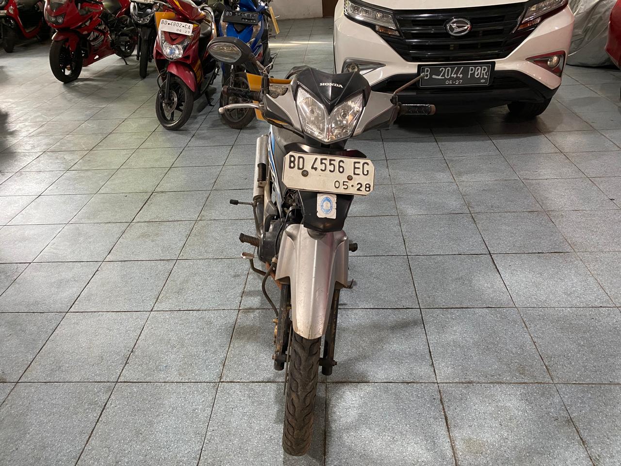 1 (satu) unit sepeda motor Honda Supra X Nomor Polisi BD 4556 EC warna hitam silver dengan nomor rangka: MH1JB91179K684146, nomor mesin: JB91E1680935