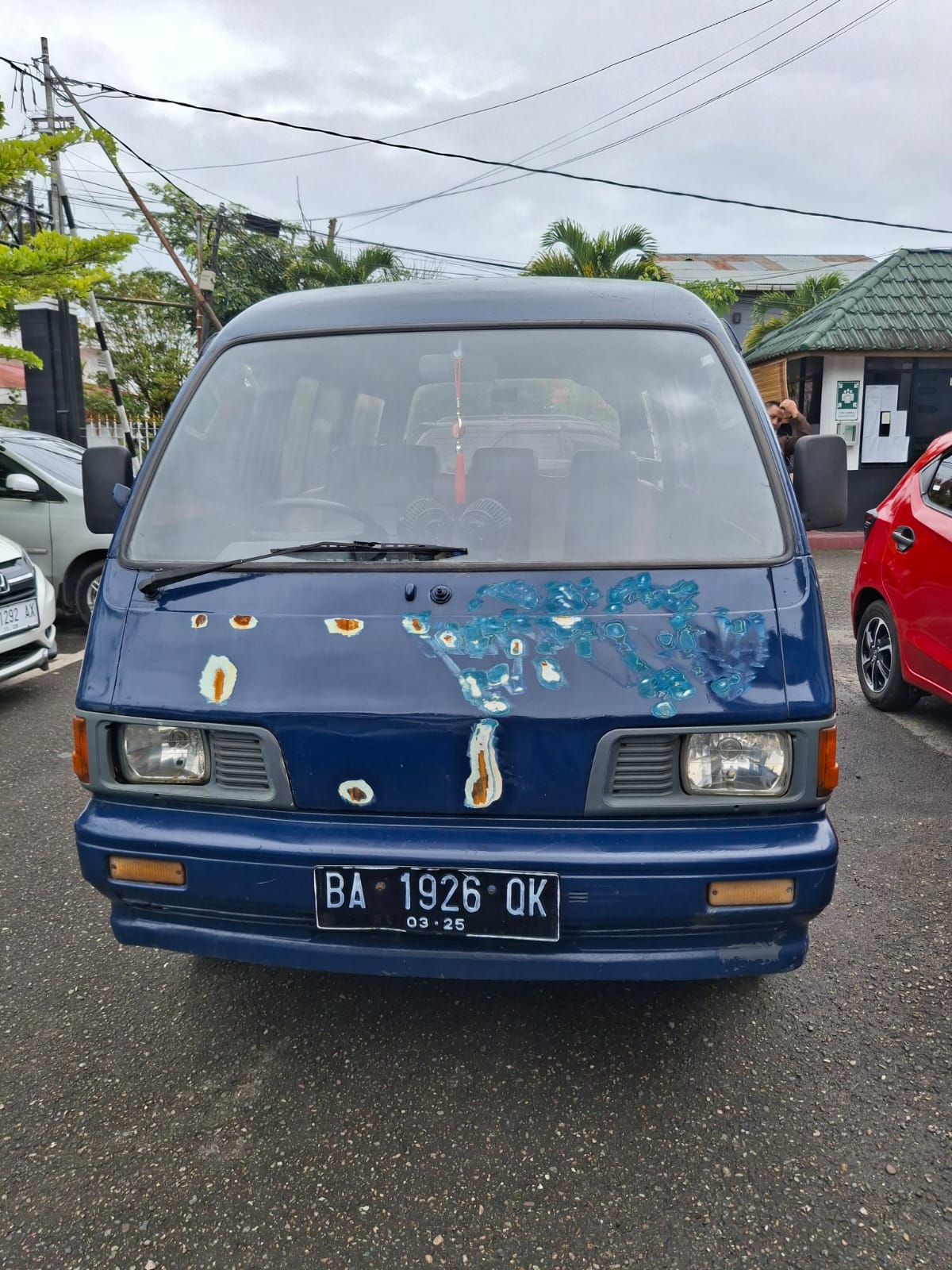mobil merk Daihatsu Zebra warna biru dengan nomor polisi BA 1926 QK beserta 1 (satu) buah kunci kontak.