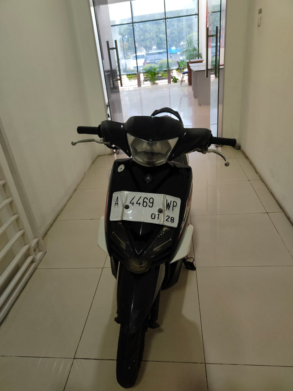 sepeda motor merk Yamaha Mio GT dengan nopol A-4469-WP warna merah hitam putih berikut dengan 1 (satu) buah kunci kontak