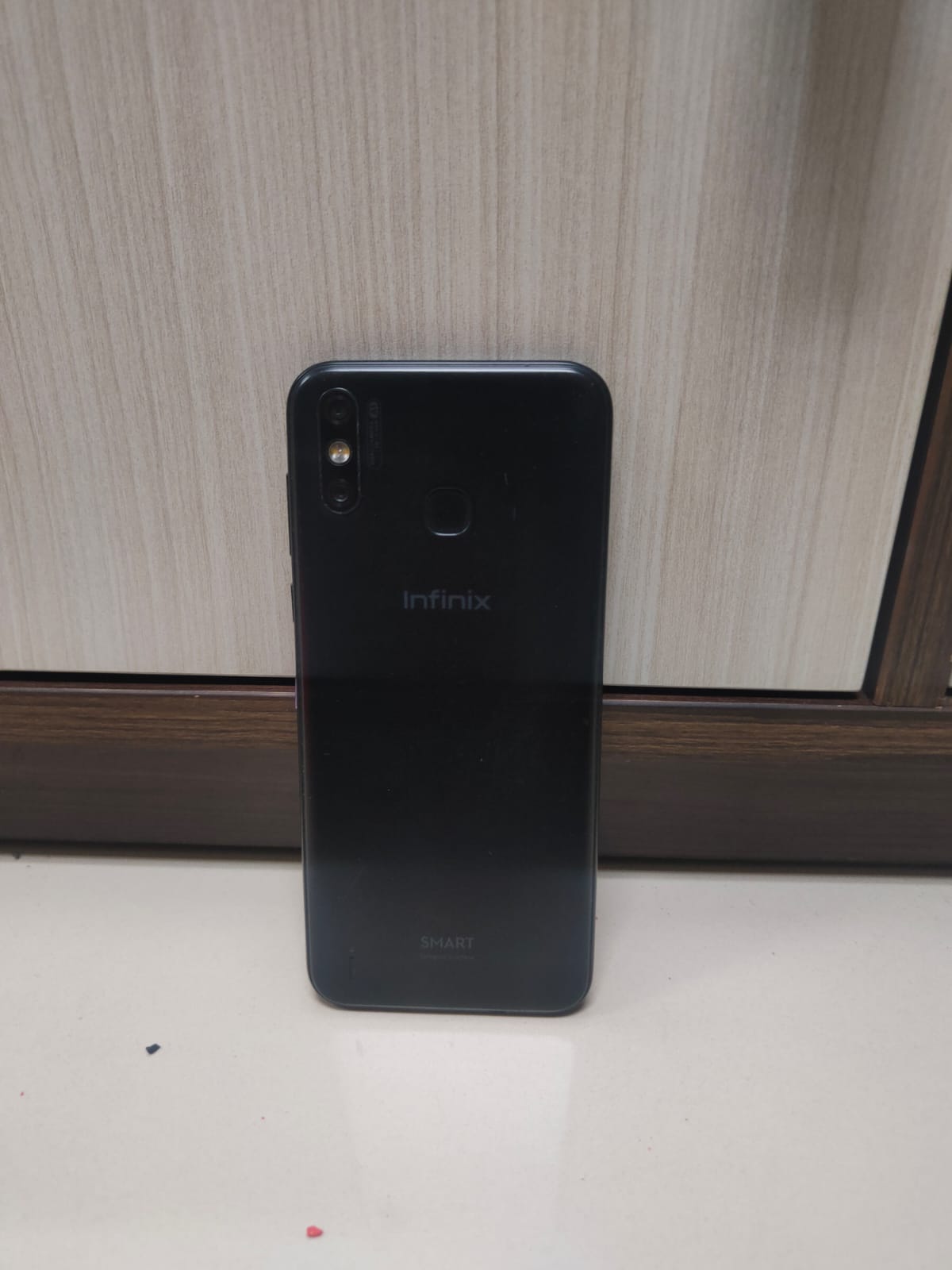  handphone merek INFINIX. type HOT 4. Nomor Telepon 0895339988026. warna hitam. IMEI 1 358844105631567. IMEI 2 358844105631575