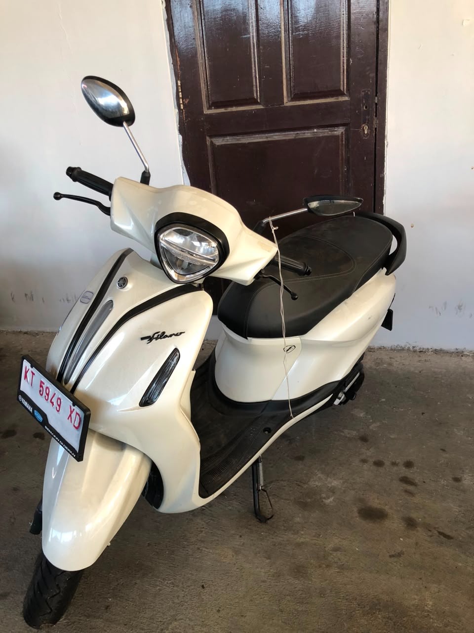 1 unit sepeda motor matic merk Yamaha Filano warna putih Nopol KT 5949 XD