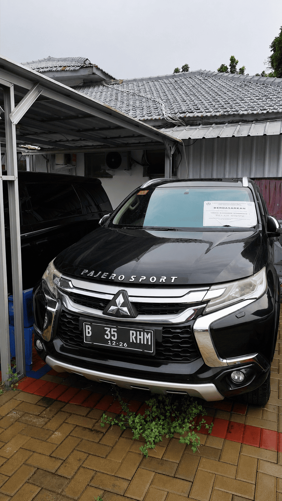 1 ( satu) Unit Kendaraan Roda Empat/Mobil Jeep merk  MITSUBISHI Type Pajero Sport 2.4L Dakar , No Registrasi/Nomor Polisi  B 35 RHM ,Tahun Pembuatan 2016 isi silinder 2.442 cc, warna Hitam Mika Nomor Rangka/NIK/VIN MMBGUKR10GH035048,Nomor Mesin 4N15UBB0189 dan 1 (satu) Buku Pemilik Kendaraan Bermotor (BPKB) No. R-02746472  atas nama Terdakwa ROHMAN 