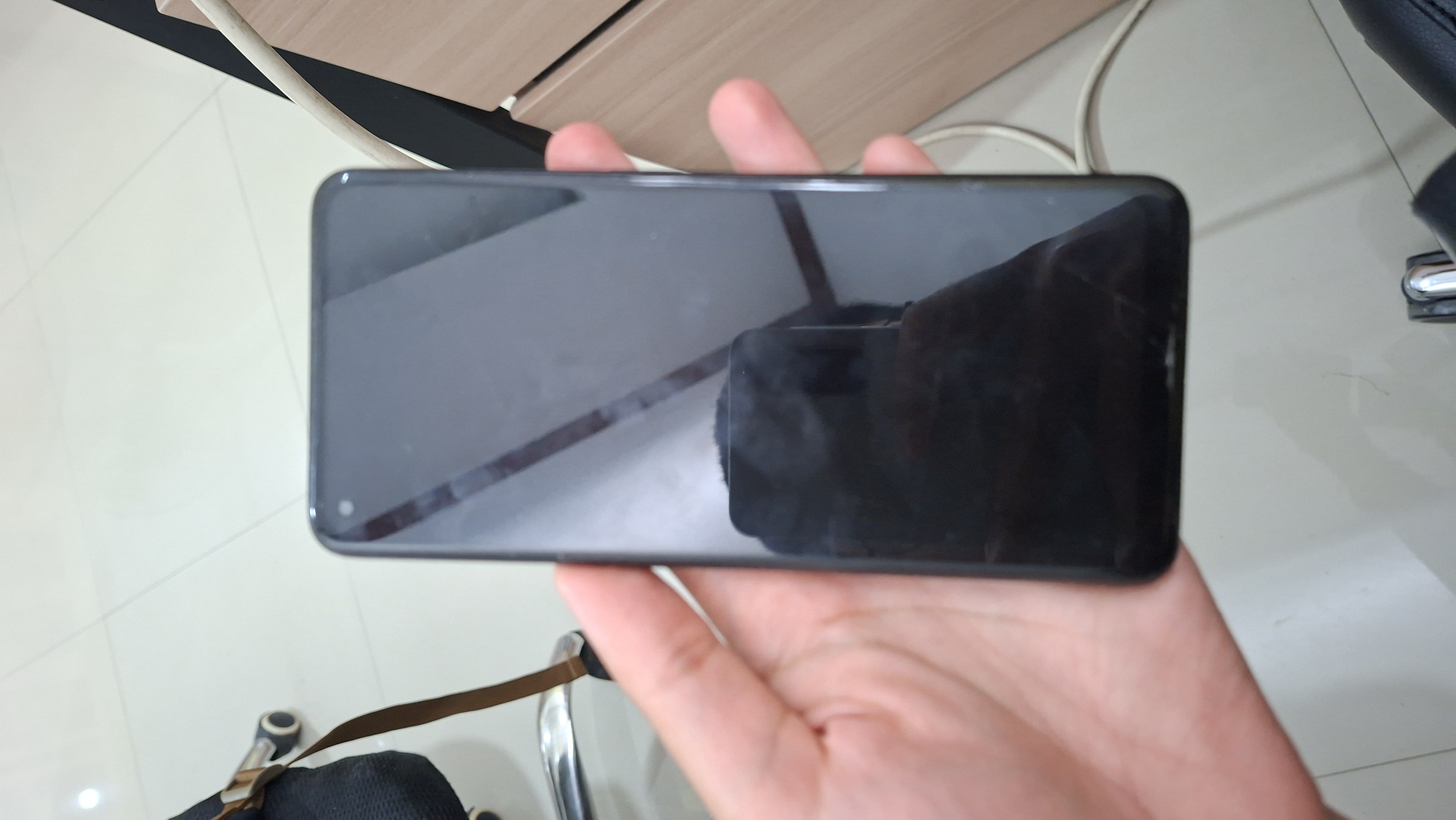 1 (satu) Buah handphone dengan merk Oppo berwarna merah milik terlapor dengan nomor IMEI 860891050618298