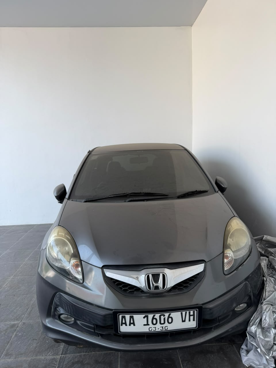 mobil Honda Brio satya wama Abu Abu Metalik Nopol AA 1606 VE beserta STNK