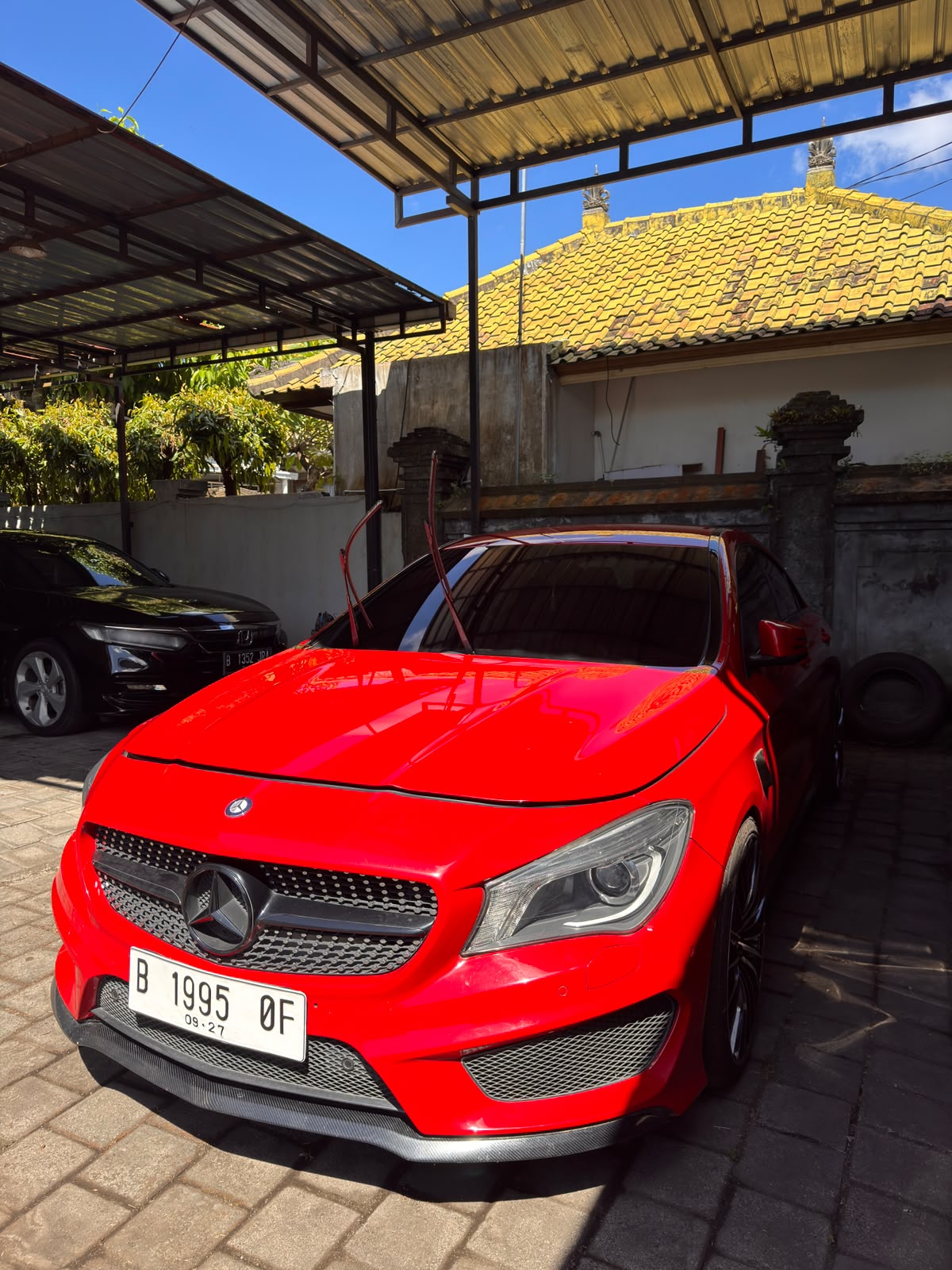 Mobil Marcedez Benz warna merah tipe CLA 200 AT (C117) tahun 2014, no.pol. B 1995 OF berikut kunci 